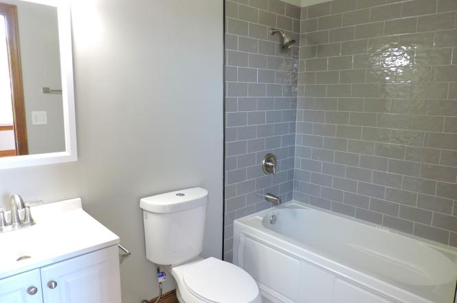 Bright 3BR/2BA Near UChicago | Vaulted Ceilings + Skylights | Pet Friendly | $2,200