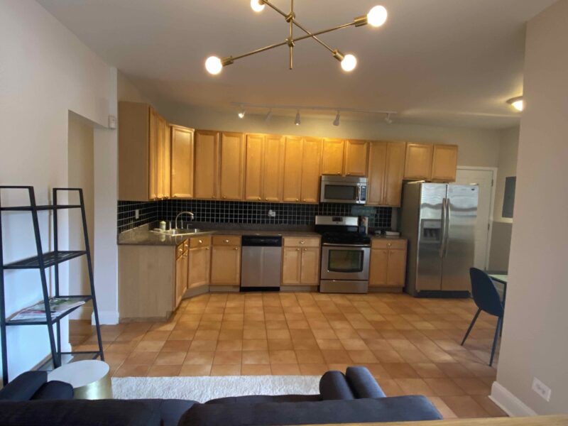 Lovely large 3 bedroom, 3 bath sunny duplex across the street from campus!