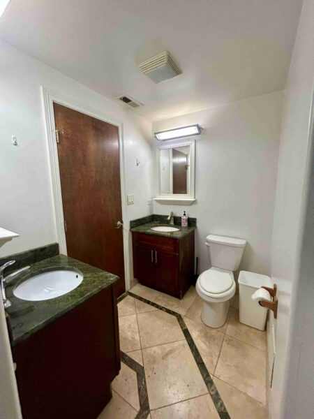 61st and Kimbark - Garden unit, front bedroom with shared bathroom