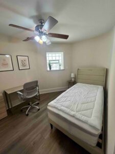 61st and Kimbark - Garden unit, front bedroom with shared bathroom